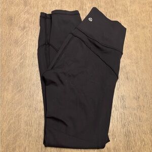 Lululemon black leggings size 4